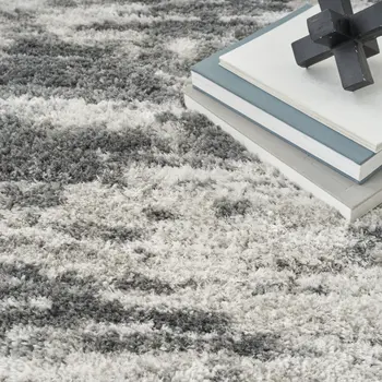 5' X 7' Charcoal and Ivory Abstract Shag Area Rug