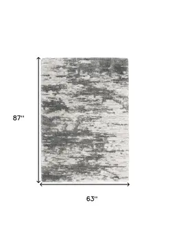 5' X 7' Charcoal and Ivory Abstract Shag Area Rug