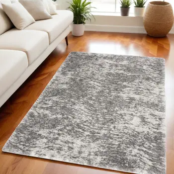5' X 7' Charcoal and Ivory Abstract Shag Area Rug