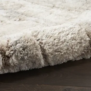 5' X 7' Beige and Ivory Abstract Shag Area Rug