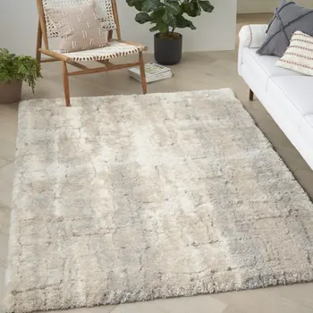 5' X 7' Beige and Ivory Abstract Shag Area Rug
