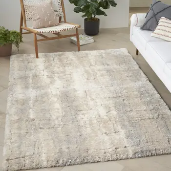 5' X 7' Beige and Ivory Abstract Shag Area Rug