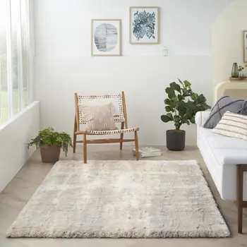 5' X 7' Beige and Ivory Abstract Shag Area Rug