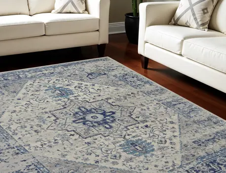 8' X 10' Ivory And Light Blue Floral Medallion Distressed Area Rug