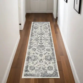8' Cream and Gray Floral Distressed Runner Rug