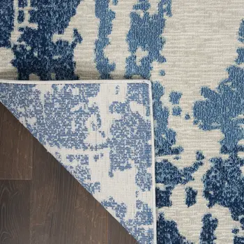 5' X 7' Blue and Ivory Abstract Distressed Non Skid Area Rug