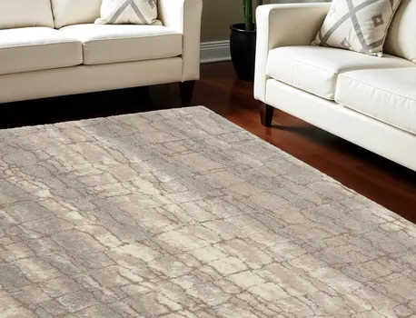 7' X 9' Beige Ivory and Gray Abstract Shag Area Rug