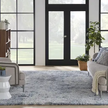 7' X 9' Light Blue Navy Blue and Beige Abstract Shag Area Rug