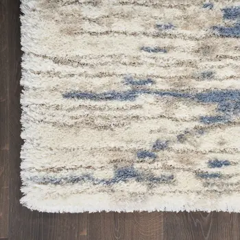 7' X 9' Light Blue Gray and Beige Abstract Shag Area Rug