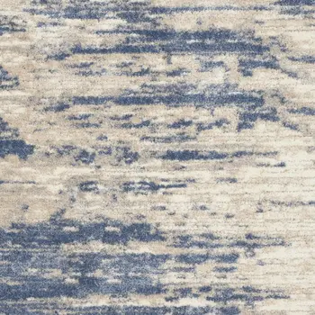 7' X 9' Light Blue Gray and Beige Abstract Shag Area Rug