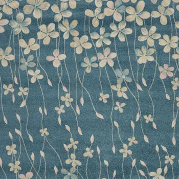 9' X 12' Turquoise and Cream Floral Area Rug