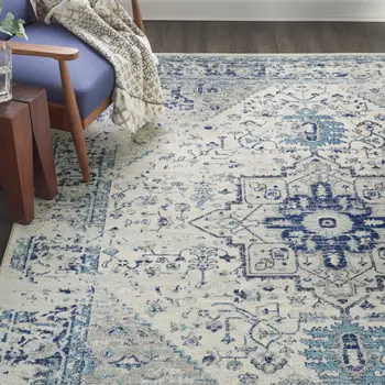 9' X 12' Ivory And Light Blue Floral Medallion Distressed Area Rug