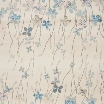 9' X 12' Ivory And Blue Floral Area Rug