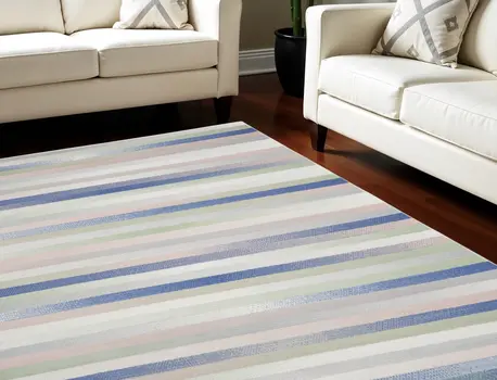 8' X 12' Ivory Tan and Blue Abstract Distressed Non Skid Area Rug