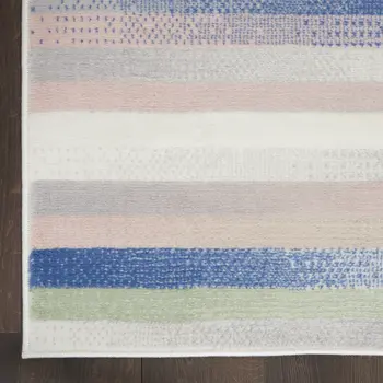 8' X 12' Ivory Tan and Blue Abstract Distressed Non Skid Area Rug