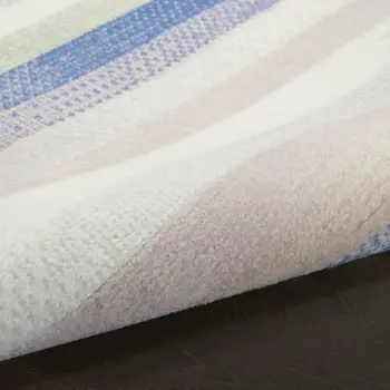 8' X 12' Ivory Tan and Blue Abstract Distressed Non Skid Area Rug