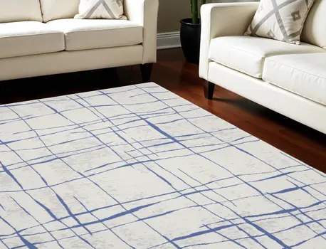 8' X 12' Ivory and Blue Abstract Geometric Distressed Non Skid Area Rug