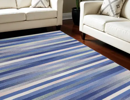 8' X 12' Ivory Tan and Blue Abstract Distressed Non Skid Area Rug
