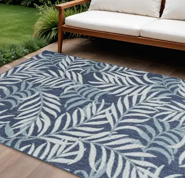 9' X 12' Navy Blue And Ivory Palm Leaf Indoor Outdoor Area Rug
