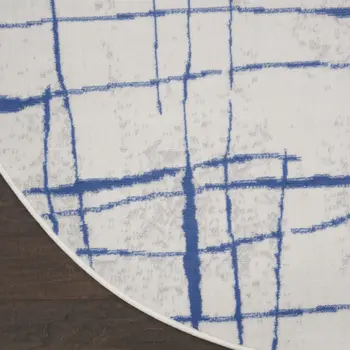 8' Ivory and Blue Abstract Distressed Round Rug