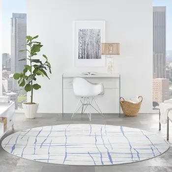8' Ivory and Blue Abstract Distressed Round Rug