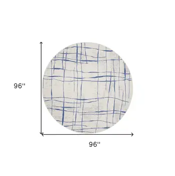 8' Ivory and Blue Abstract Distressed Round Rug