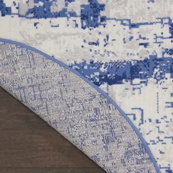 8' Ivory and Navy Blue Abstract Round Rug