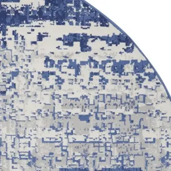 8' Ivory and Navy Blue Abstract Round Rug