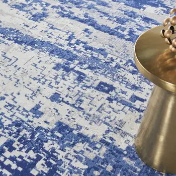8' Ivory and Navy Blue Abstract Round Rug