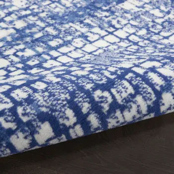 8' Ivory and Navy Blue Abstract Round Rug