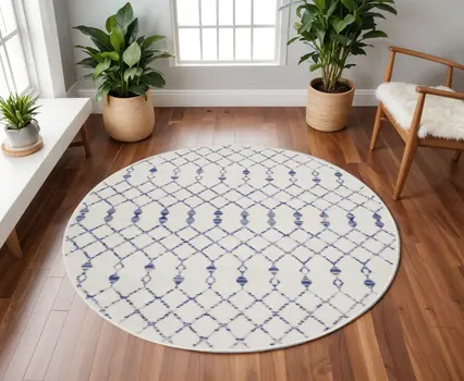 8' Ivory and Blue Geometric Round Rug