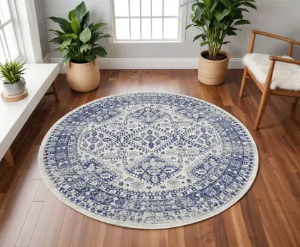 8' Ivory and Navy Blue Geometric Distressed Round Rug