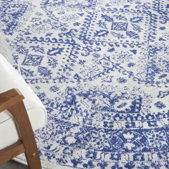 8' Ivory and Navy Blue Geometric Distressed Round Rug