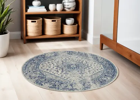 5' Ivory And Light Blue Floral Medallion Distressed Round Rug