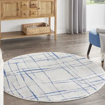 5' Ivory and Blue Abstract Geometric Distressed Round Rug