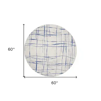 5' Ivory and Blue Abstract Geometric Distressed Round Rug