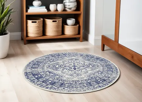 5' Ivory and Navy Blue Geometric Distressed Round Rug