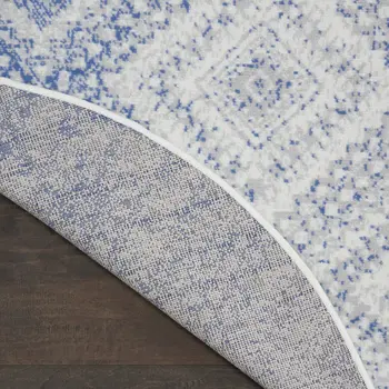 5' Ivory and Blue Geometric Distressed Round Rug