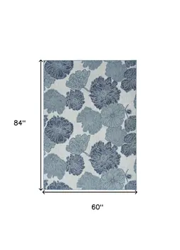 5' X 7' Navy Blue Ivory And Blue Floral Indoor Outdoor Area Rug
