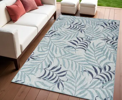 4' X 6' Navy Blue Ivory And Blue Palm Leaf Indoor Outdoor Area Rug