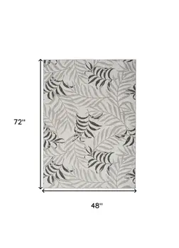 4' X 6' Gray Black And Ivory Palm Leaf Indoor Outdoor Area Rug