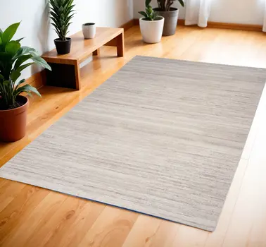 4' X 6' Ivory and Light Brown Abstract Washable Area Rug