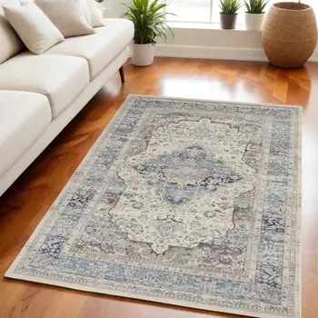 5' X 8' Ivory Blue And Orange Floral Distressed Area Rug