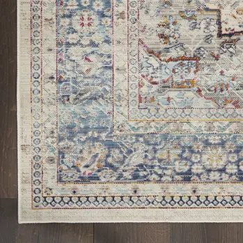5' X 8' Ivory Blue And Orange Floral Distressed Area Rug