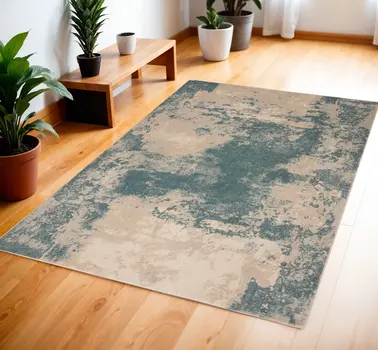 4' X 6' Ivory and Teal Blue Abstract Area Rug