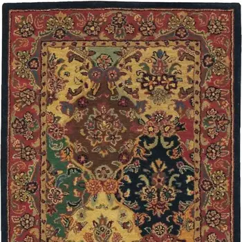 5' X 8' Tan Black and Red Wool Floral Area Rug