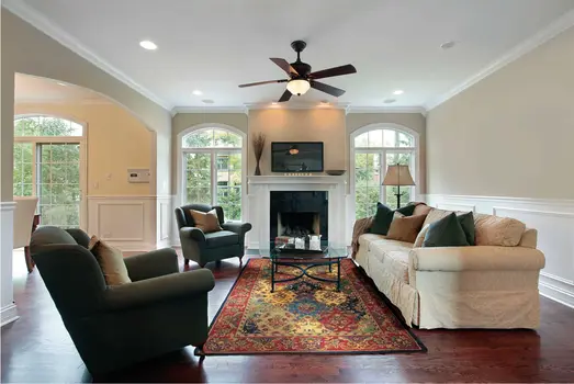 5' X 8' Tan Black and Red Wool Floral Area Rug