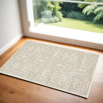 2' X 4' Beige and Ivory Floral Area Rug