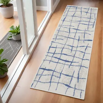 6' Ivory and Blue Abstract Geometric Distressed Runner Rug