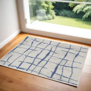 3' X 5' Ivory and Blue Abstract Geometric Distressed Area Rug